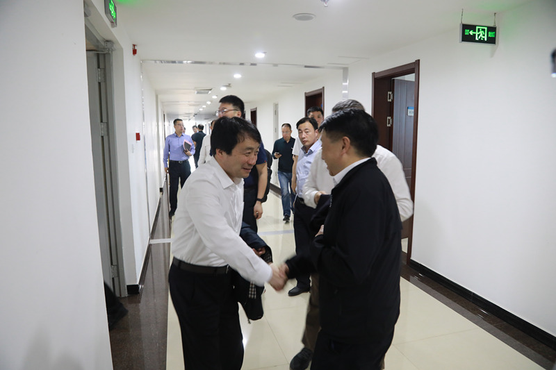 熊良虎拜会榆林市委副书记张成功、市人大常委会副主任孙守洋